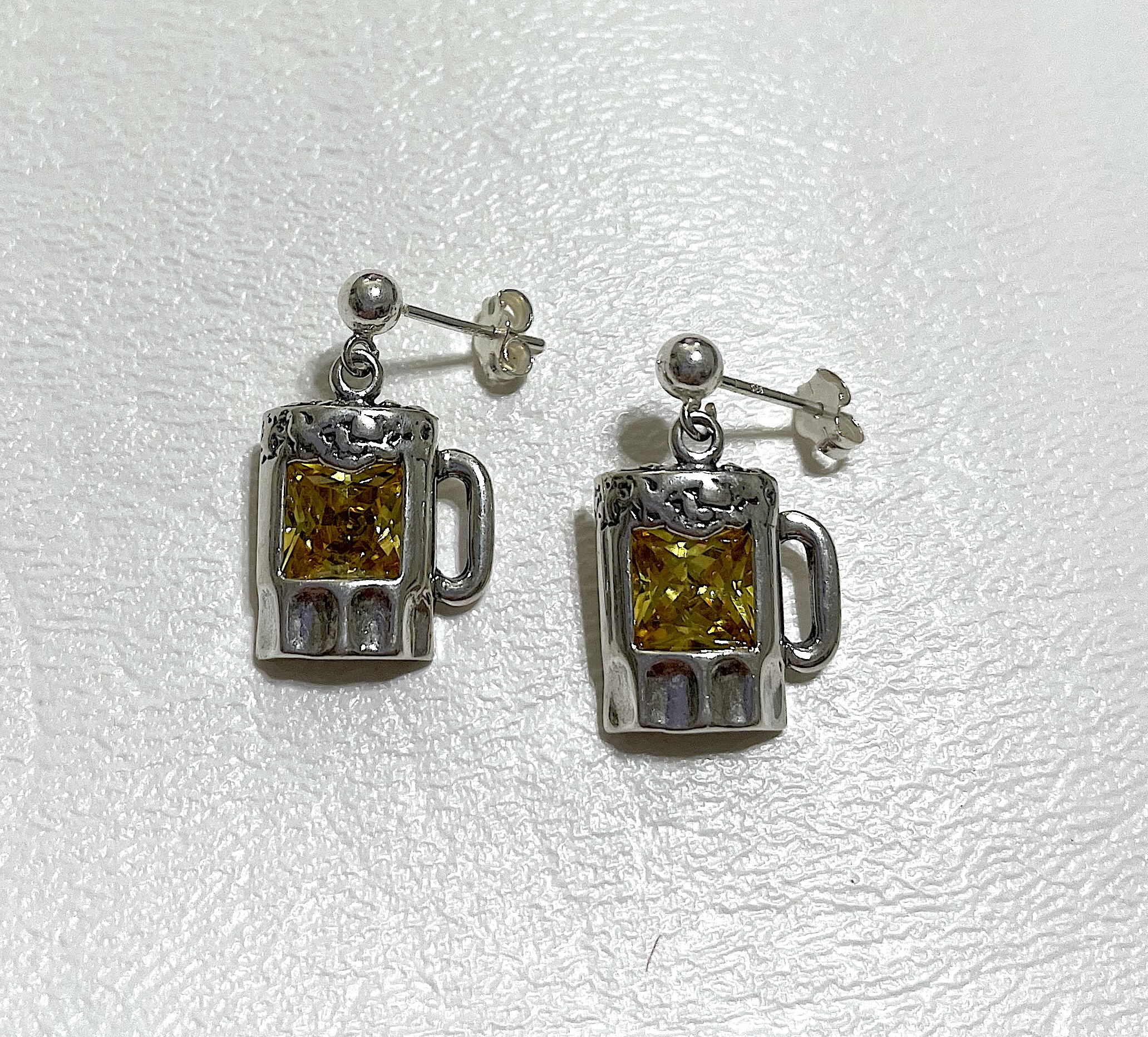 Earrings on white background