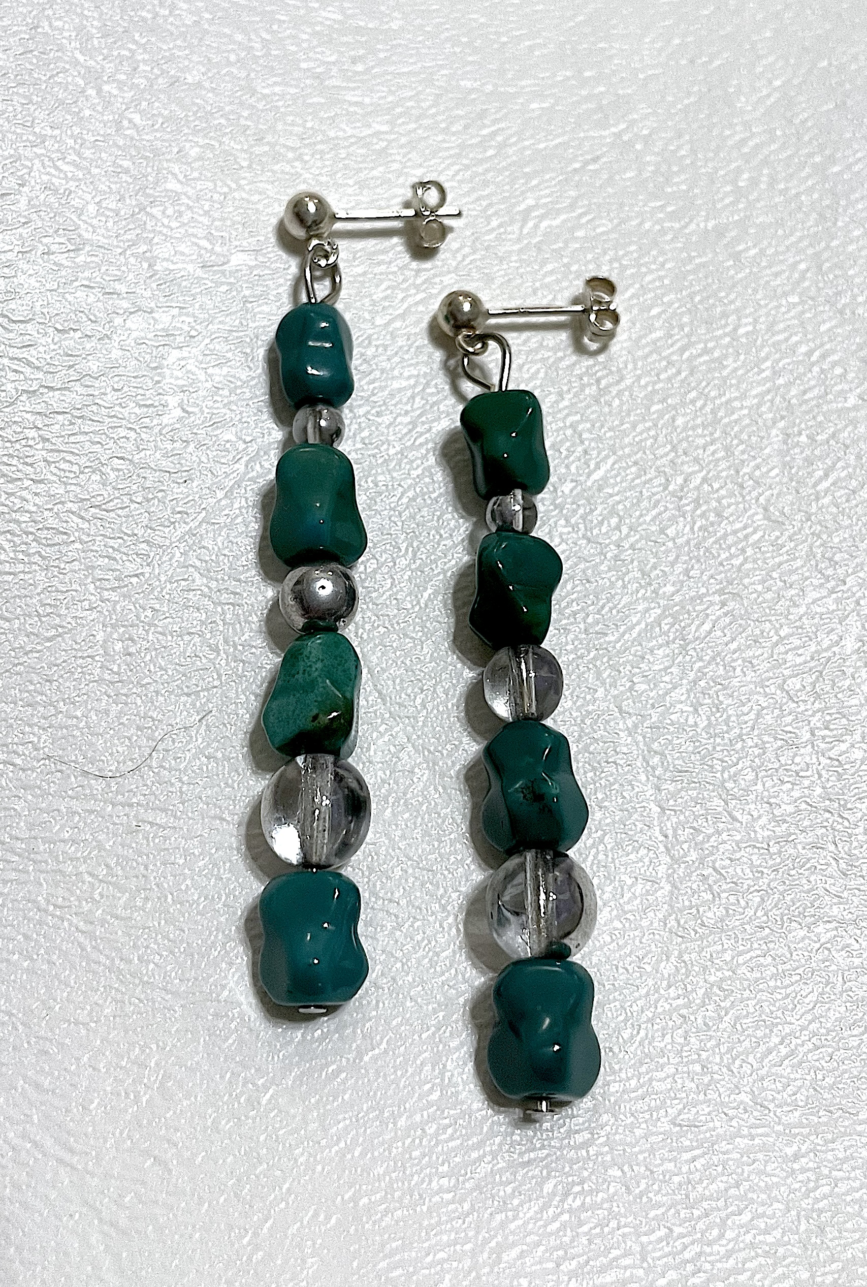 Earrings on white background