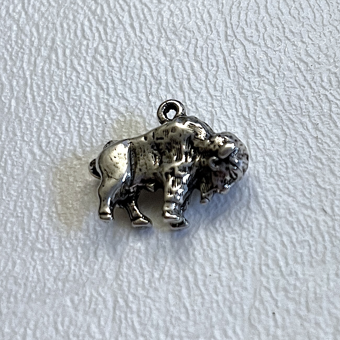 Charm on white background