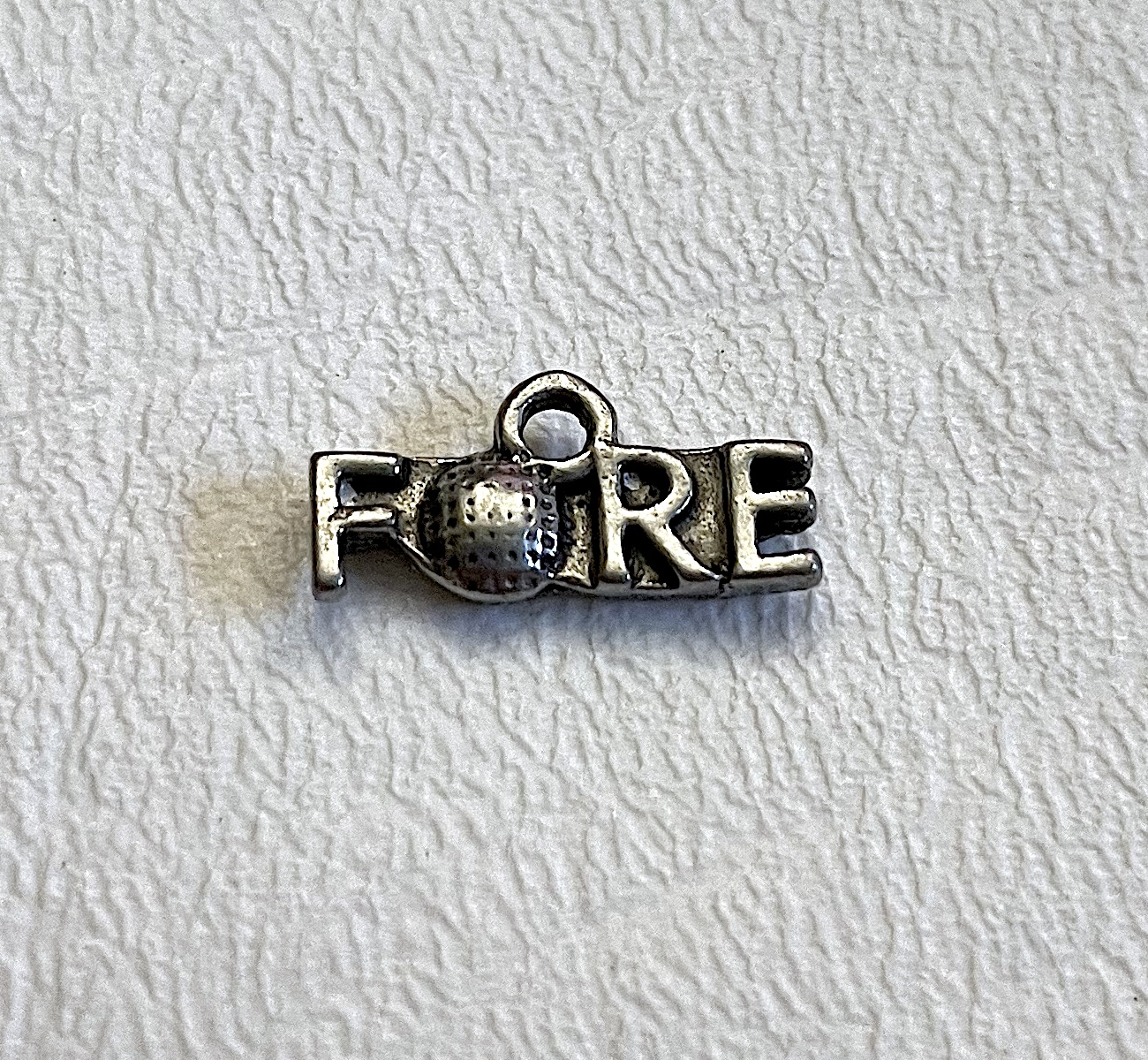 Charm on white background