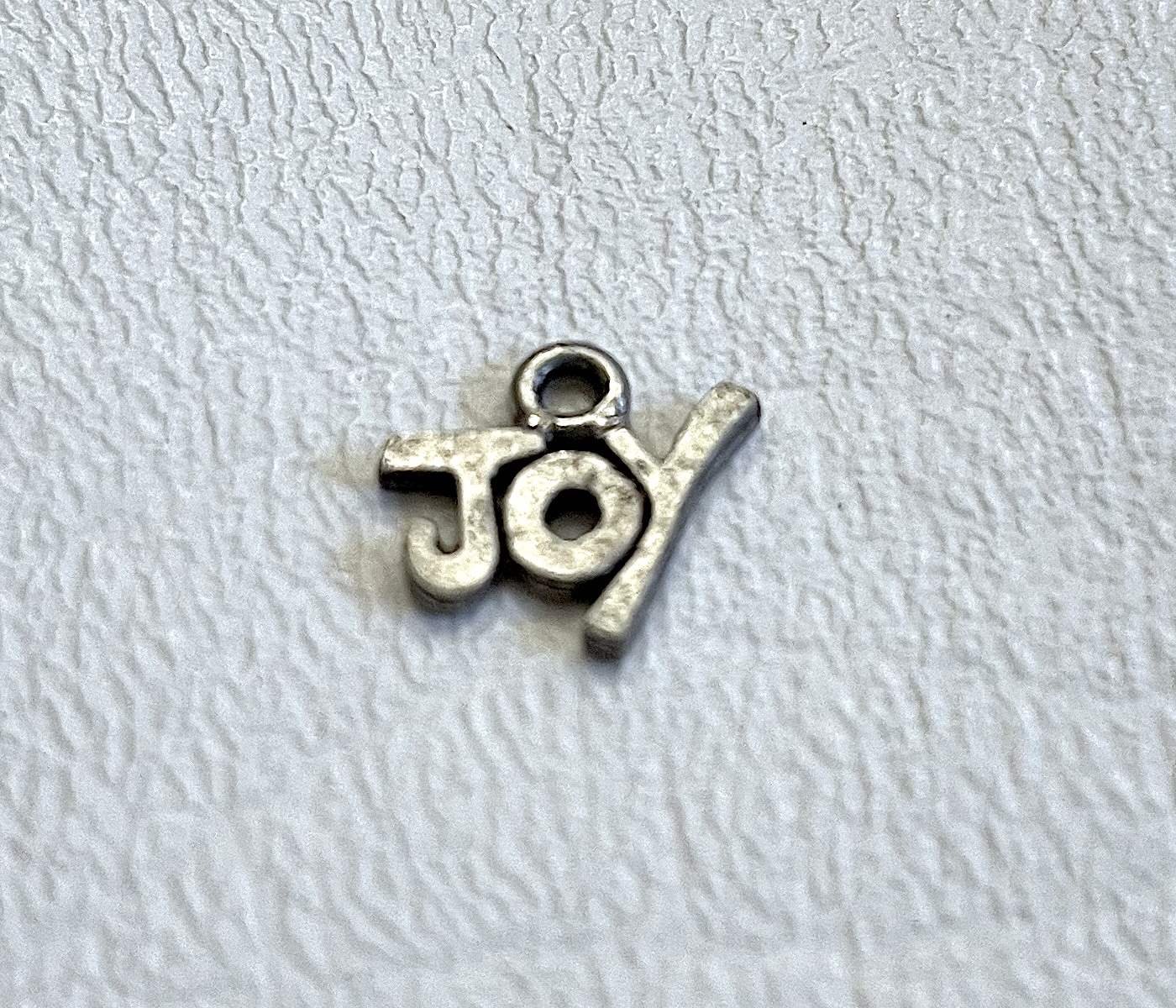 Charm on white background