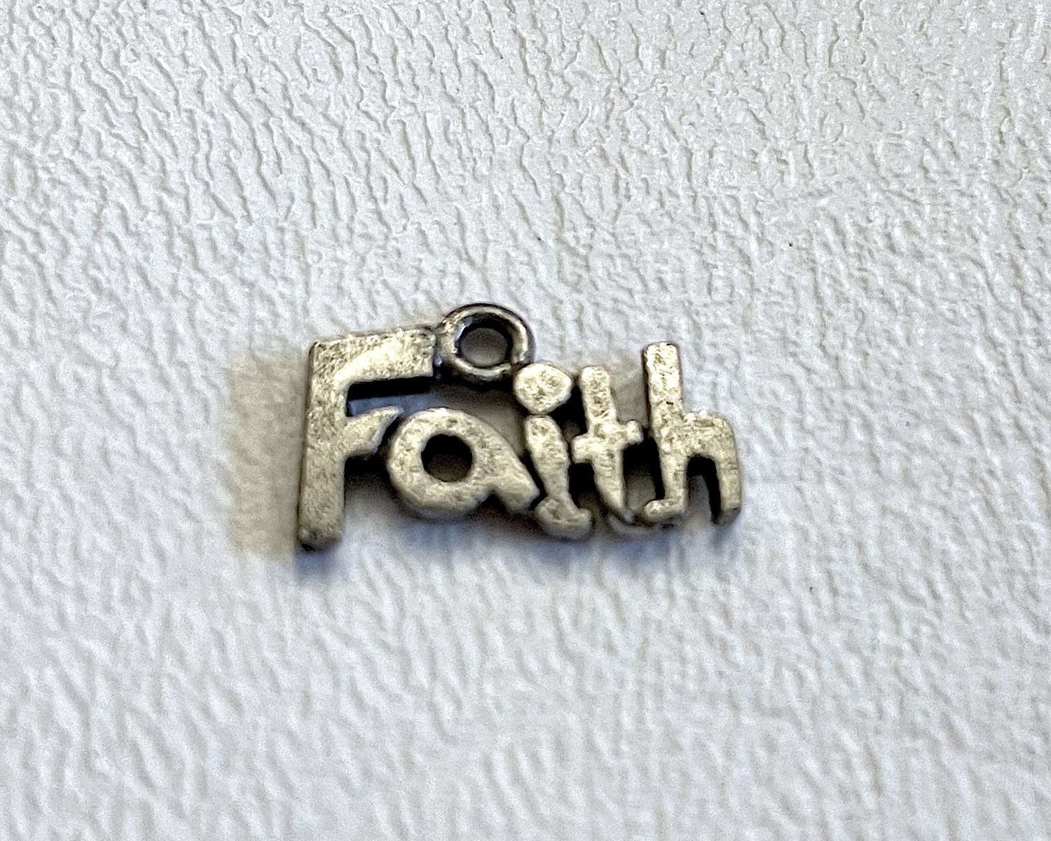 Charm on white background