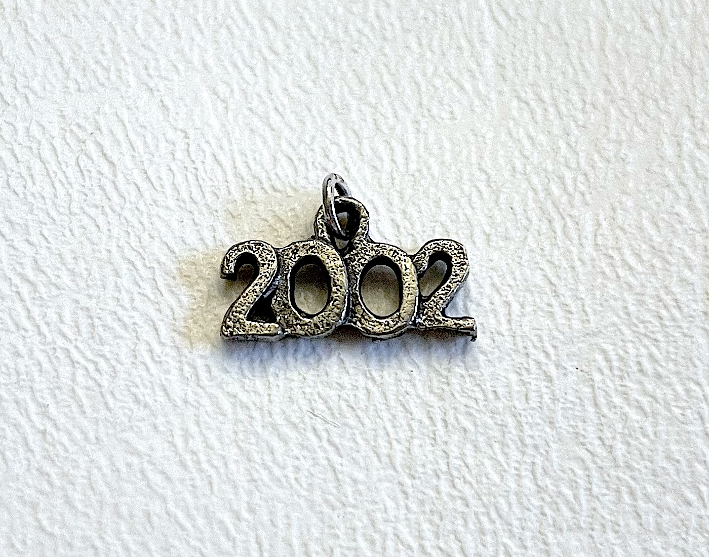 Charm on white background