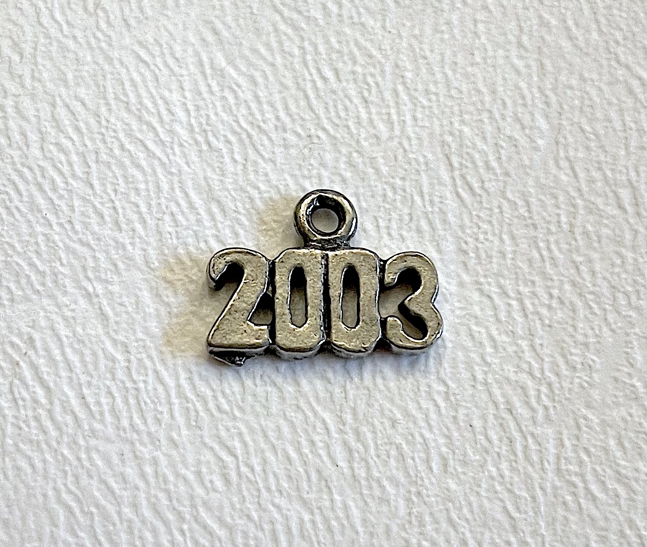 Charm on white background