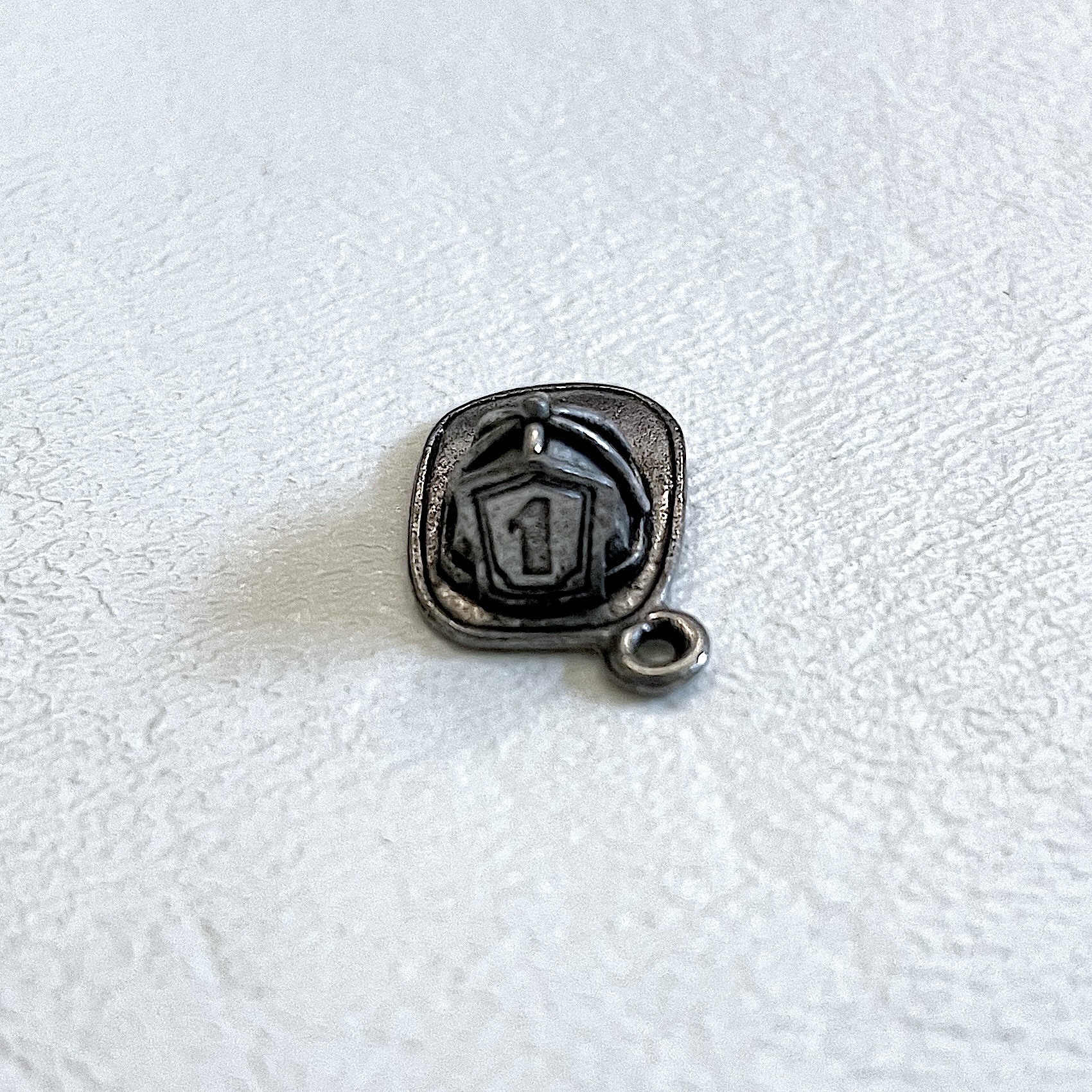 Charm on white background